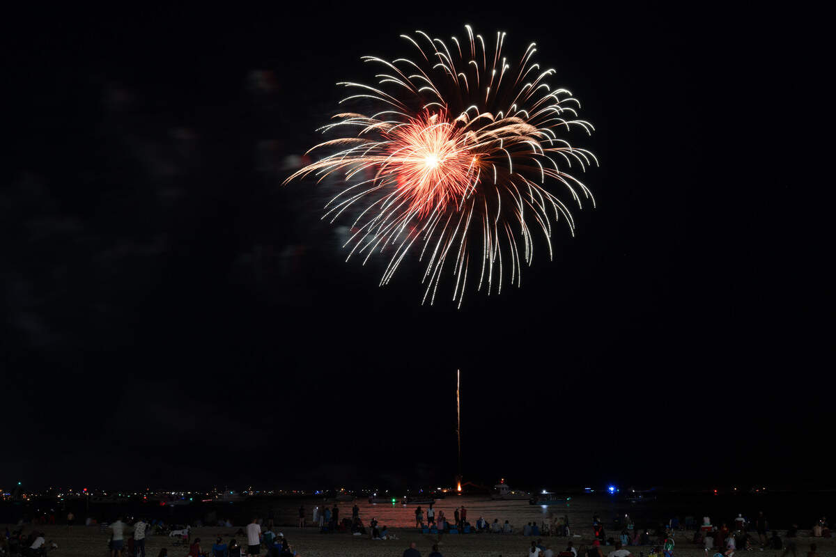 Fireworks are shot into the air during the annual show over the Mississippi Sound on Saturday, July 4, 2026.