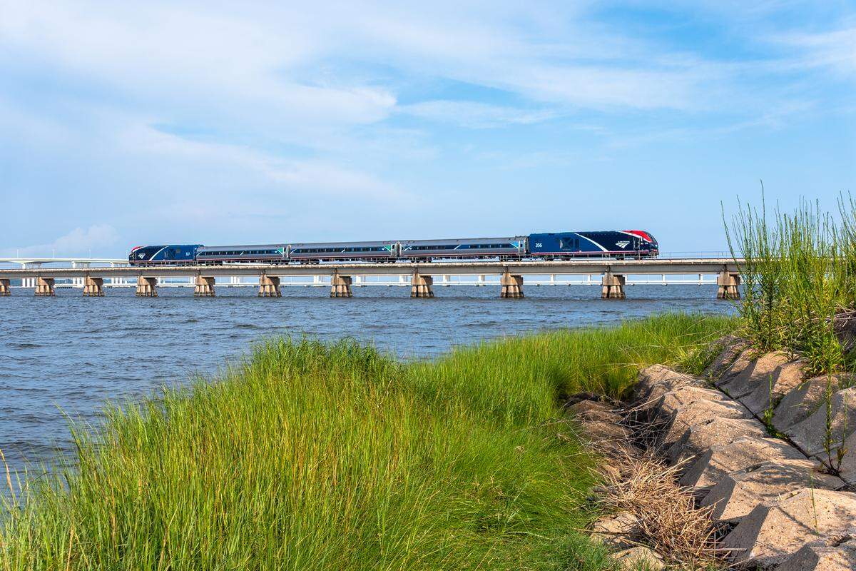 Amtrak Mardi Gras Service travels over the water at Biloxi. The new train line has the highest customer service rating of any Amtrak route in the country.