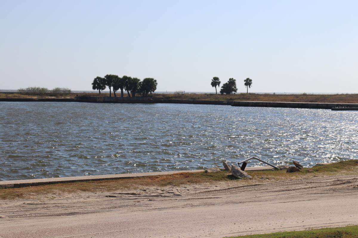 Perimeter walls protect the marina from storms and provide space for boats, fishing and bird watching in Biloxi.