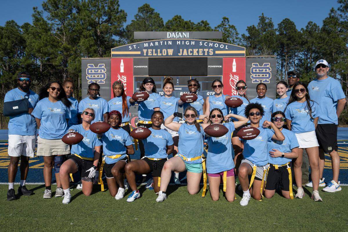 The St. Martin High School flag football team poses for a photo at Yellow Jackets Stadium in St. Martin on Tuesday, March 11, 2025.