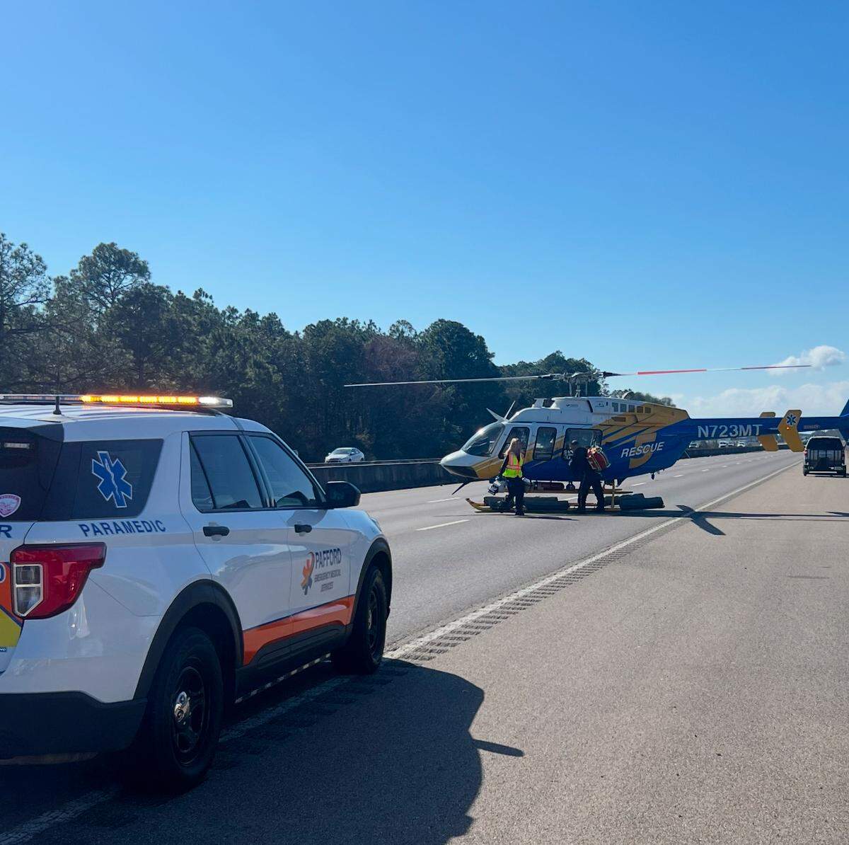 A helicopter landed on Interstate 10 on Friday, Feb. 7, 2025 to bring an injured driver to a hospital in Mobile.