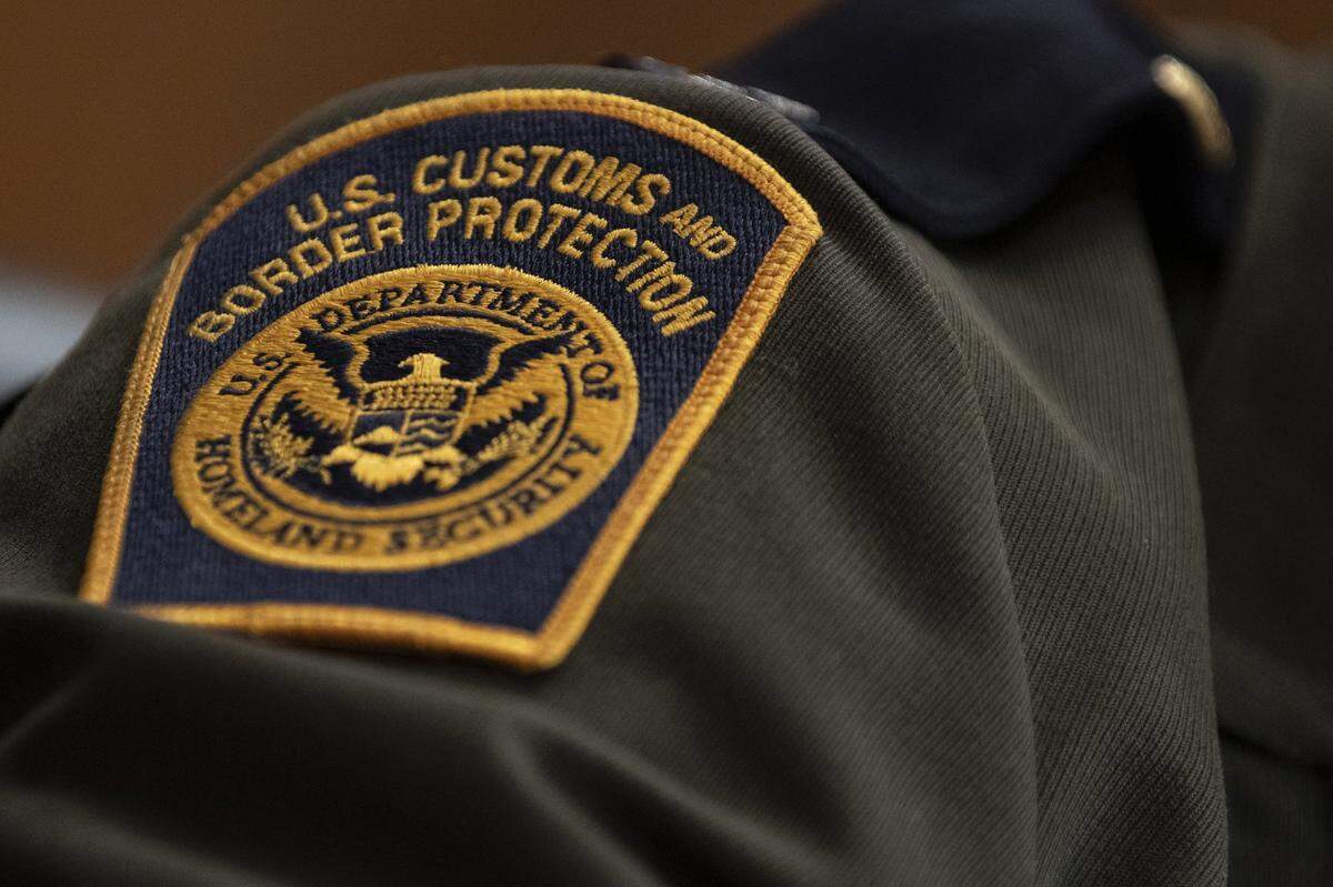 In this photo from April 9, 2019, a U.S. Customs and Border Protection patch is seen on the uniform of an agent for the U.S. Border Patrol.