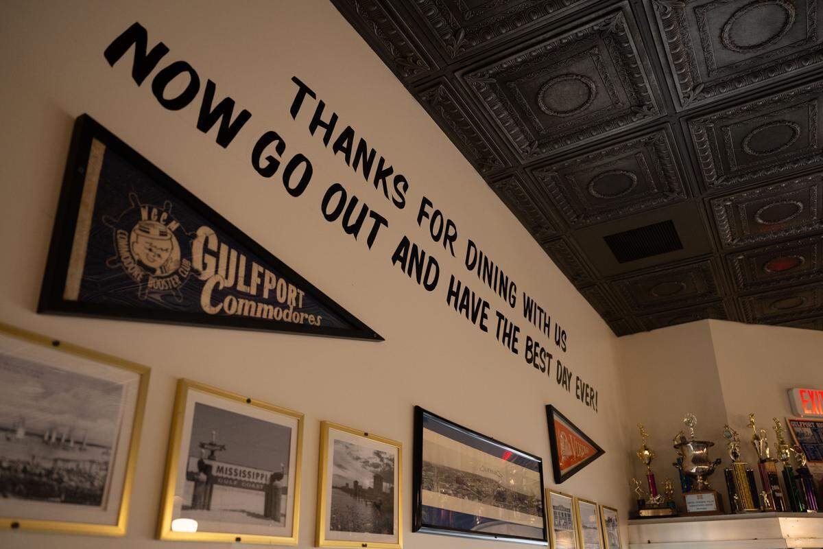 Picture frames and other decorations line the walls at The Downtowner in Gulfport on Thursday, May 28, 2026.