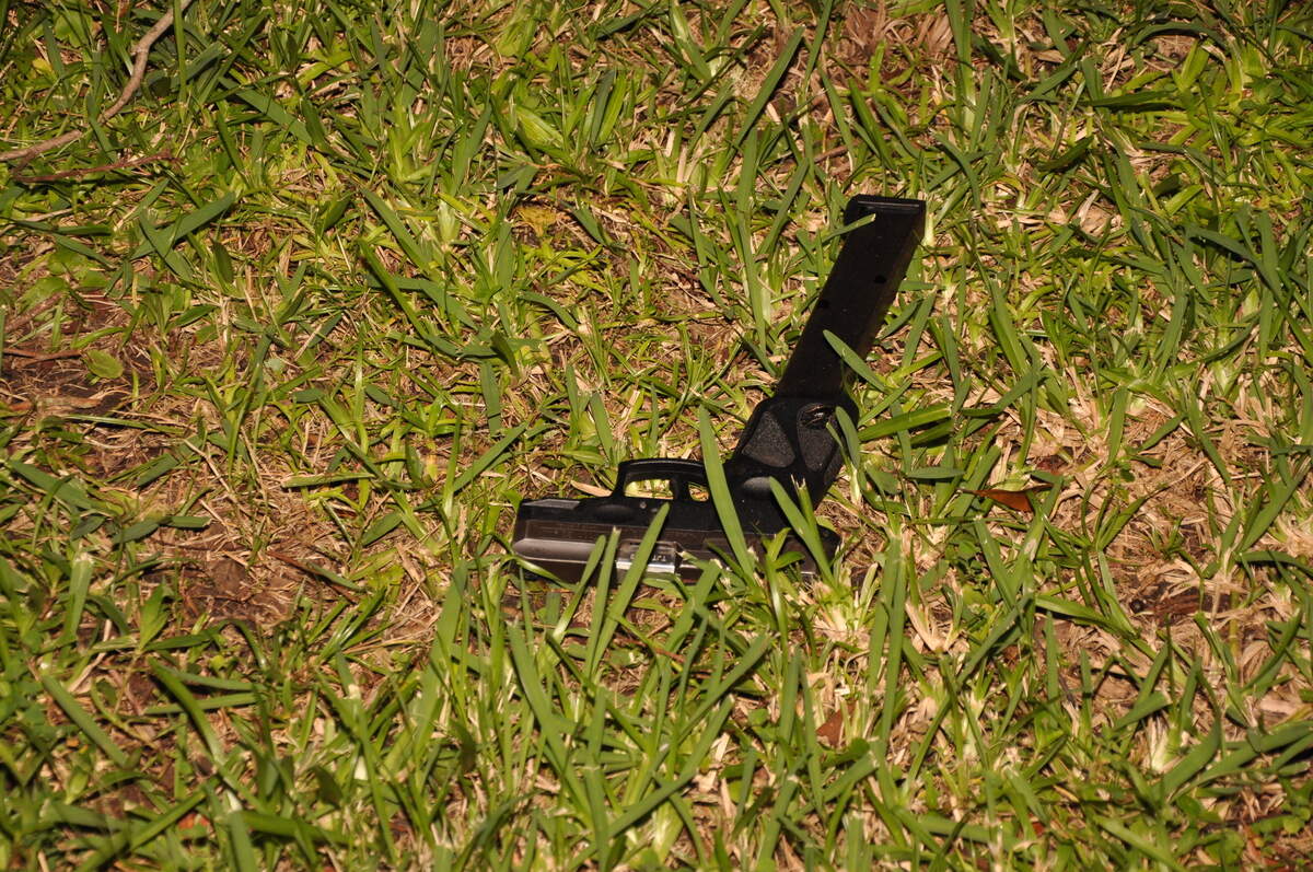 Moss Point police documented a .9 mm firearm with an extended clip that was found on the ground after Toussaint Diamon Sims was shot and killed August 8, 2019.
