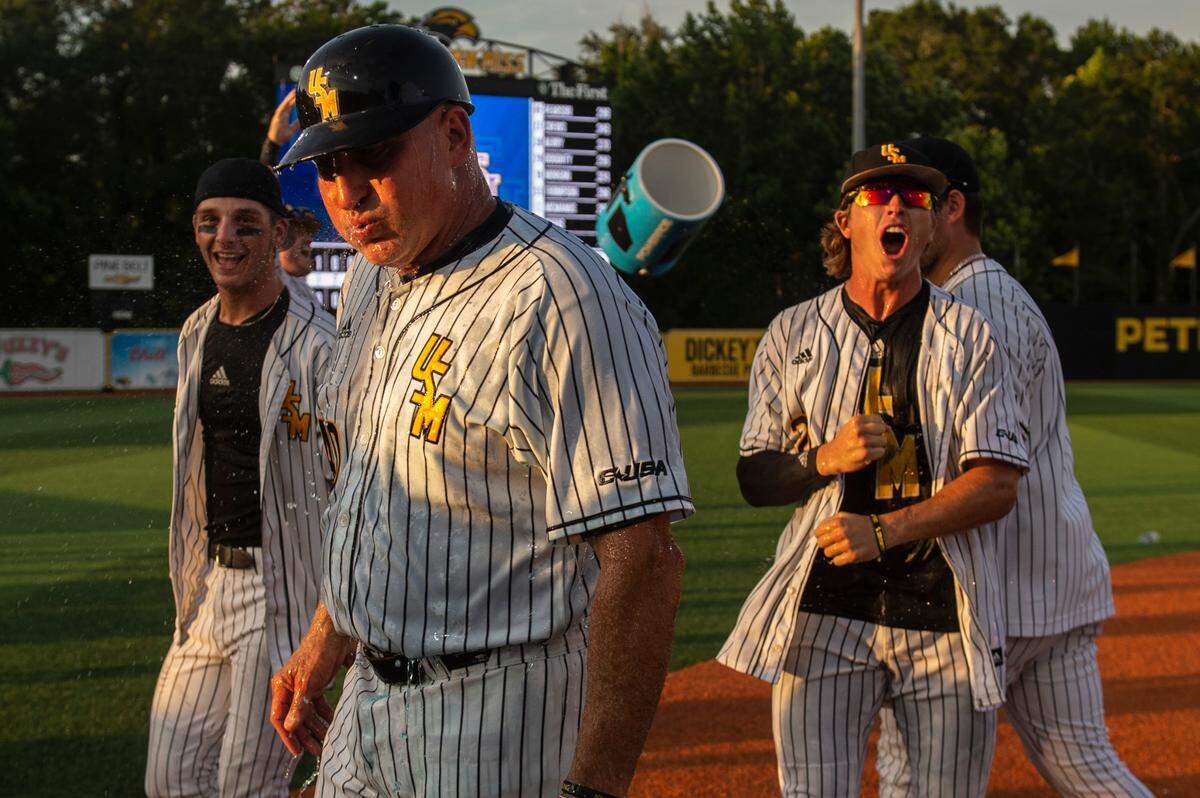 Southern Miss players celebrate after defeating LSU to win the Hattiesburg Regional on Monday, June 6, 2022.