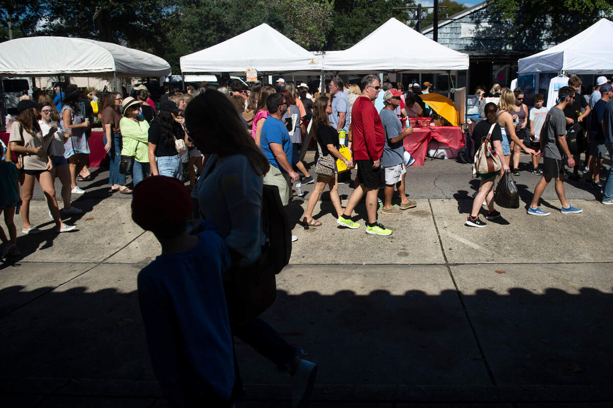 Tents selling art and crafts take over the center of Government Street and Washington Avenue during the Peter Anderson Festival in Ocean Springs in 2022.  The downtown restaurants and shops also will be open, adding more choices for shopping and dining.