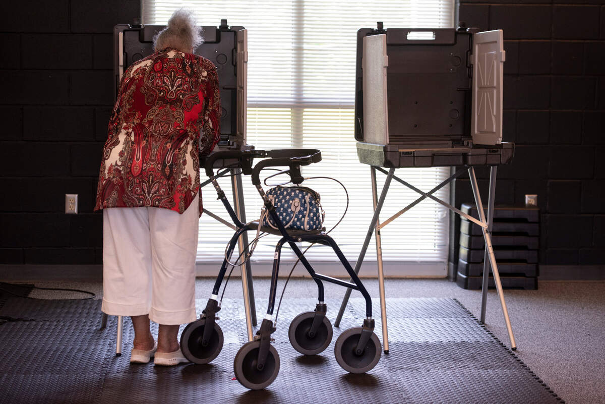 A voter casts their ballot at a polling location at Gaston Hewes Recreation Center in Gulfport during a primary runoff election on Tuesday, April 22, 2025.
