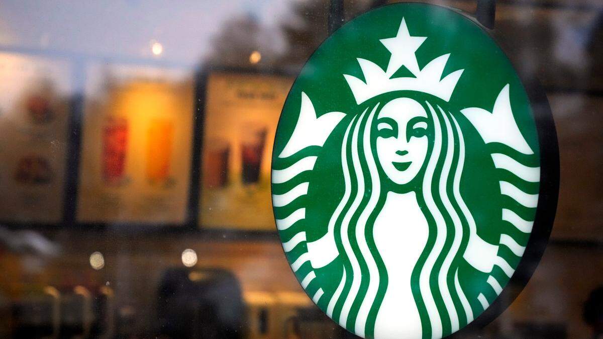 Starbucks customers have launched a petition after news that the coffee giant will begin discontinuing its raspberry flavored syrup. (AP Photo/Gene J. Puskar)