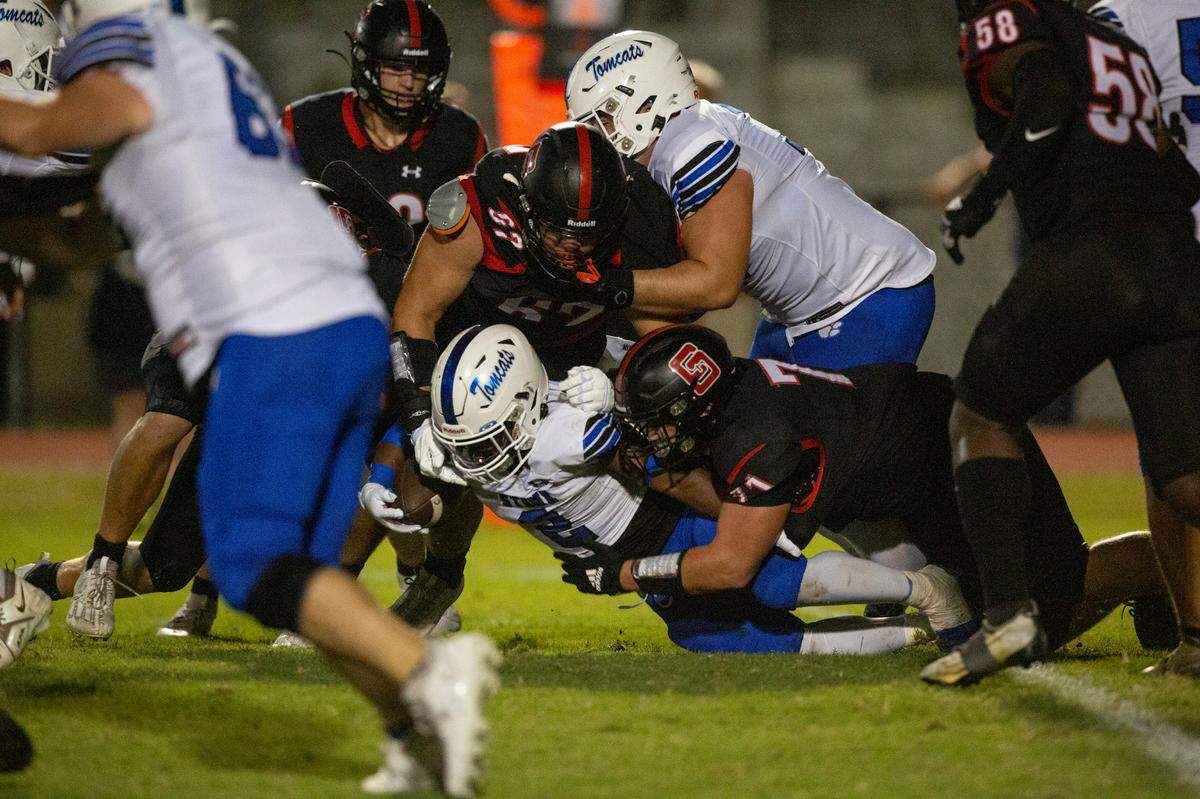 St. Stanislaus’ defense tackles Stone’s Daylon Collins during a game against the Stone Tomcats at St. Stanislaus High School in Bay St. Louis on Friday, Sept. 29, 2023.