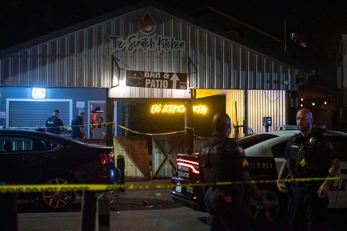 Crime scene tape surrounds The Scratch Kitchen restaurant in Ocean Springs after a shooting left 1 dead and several injured on Friday, May 5, 2023.