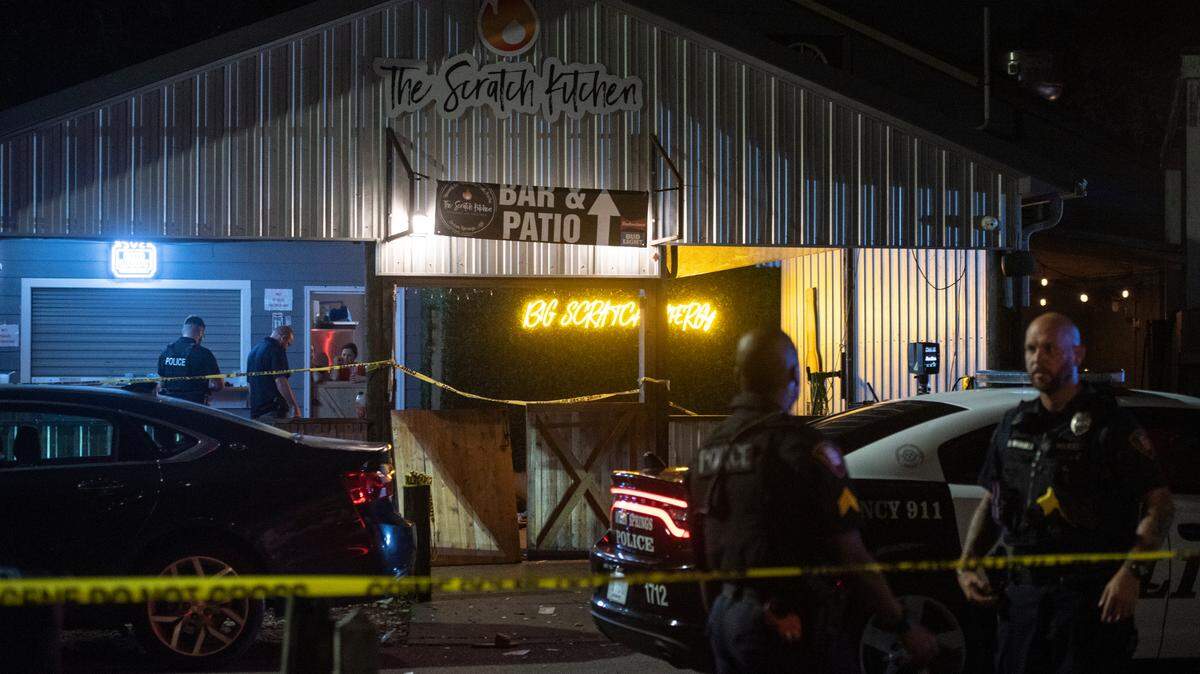 Crime scene tape surrounds The Scratch Kitchen restaurant in Ocean Springs after a shooting left 1 dead and several injured on Friday, May 5, 2023.