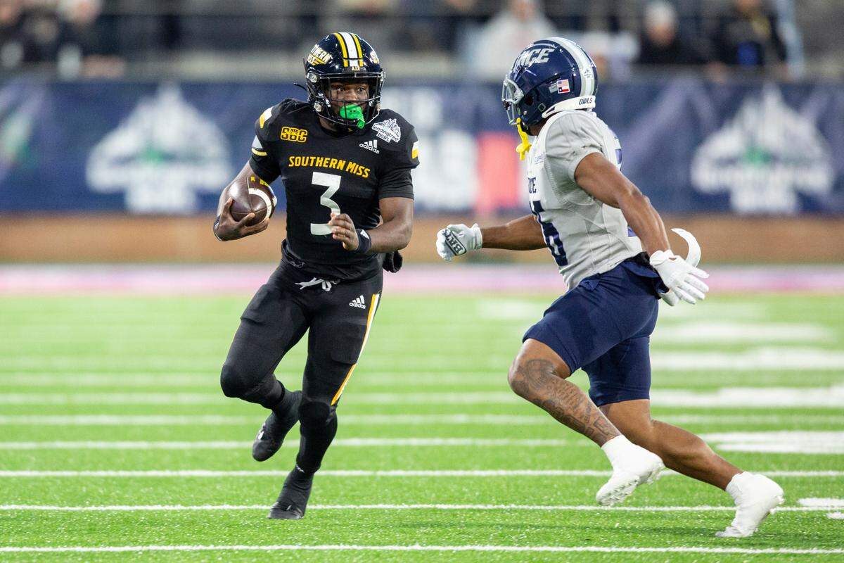 Southern Miss’ running back Frank Gore Jr. runs the ball down the field during the Lending Tree Bowl at Hancock Whitney Stadium in Mobile, Alabama on Saturday, Dec. 17, 2022.
