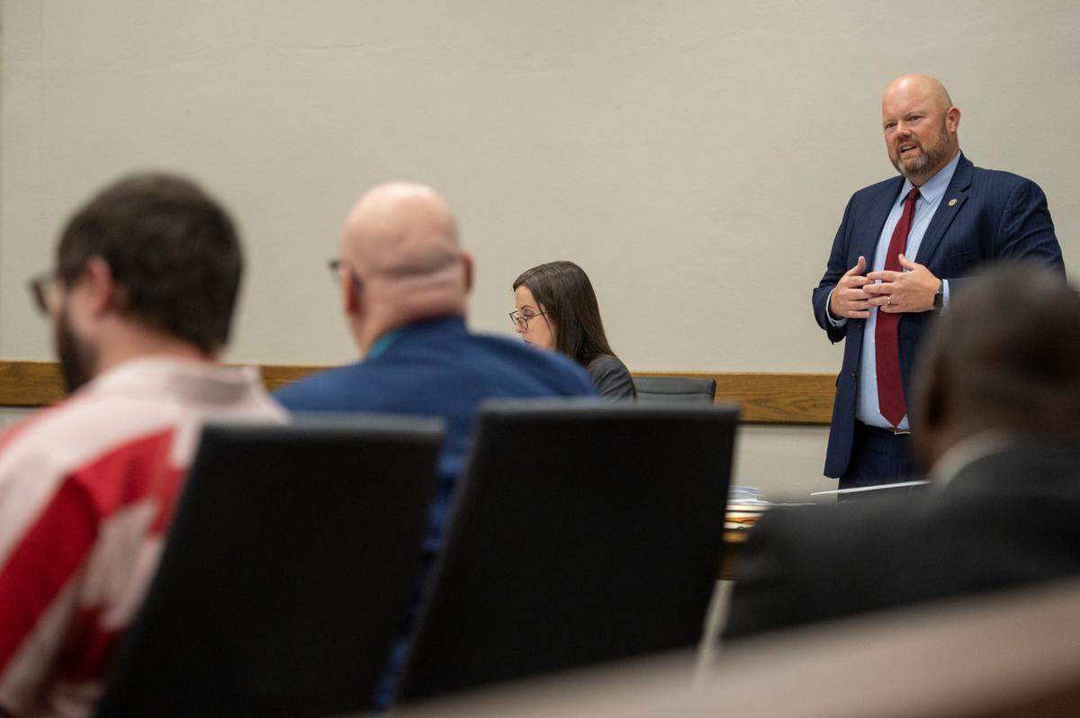 Assistant District Attorney George Huffman describes the facts of the case as John Ross McElhenney and his lawyer listen after McElhenney plead guilty to sexual battery and child exploitation in Harrison County Circuit Court in Biloxi on Tuesday, Aug. 1, 2023.