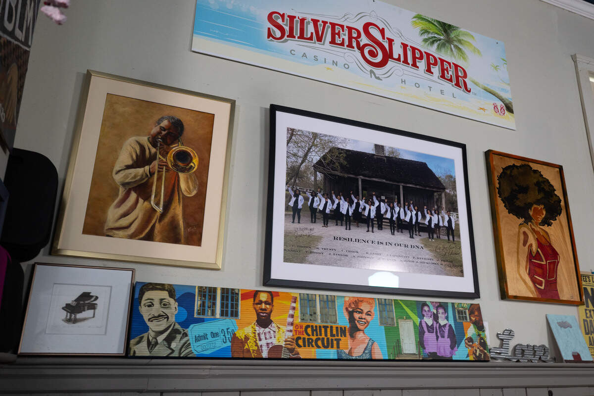 A series of artwork and photographs hangs on the walls to celebrate Black artists at the 100 Men Hall in Bay St. Louis on Tuesday, June 16, 2026.