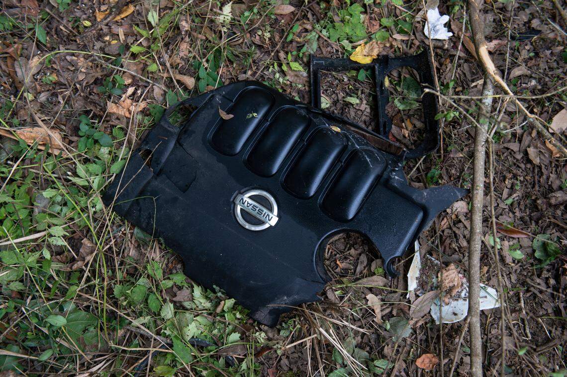 A piece of a Nissan vehicle that Chloe Taylor was driving at the site of a single vehicle car accident that killed two East Central High School Students, Baleigh Bowlin and Chloe Taylor, off of Highway 613 in Hurley on Monday, Oct. 17, 2022.