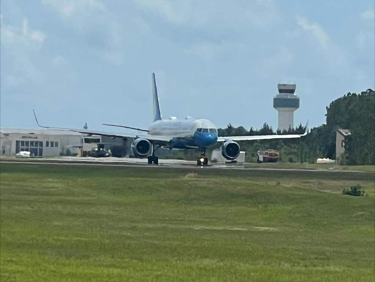 A United States of America plane taxis near the control tower at Gulfport-Biloxi International Airport during a training run.