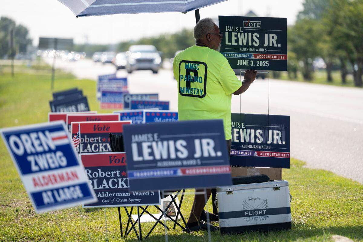 Campaign signs outside of Ocean Springs Civic Center on Election Day, Tuesday, June 3, 2025.