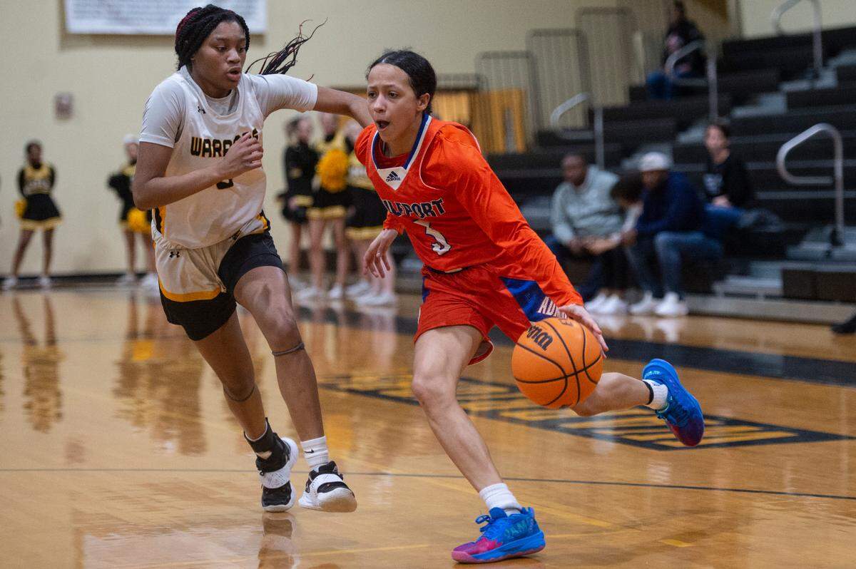 Gulfport’s Madison O’Dell retains control of the ball as she dribbles the ball down the court during a playoff game at D’Iberville High School in D’Iberville on Friday, Feb. 17, 2023.