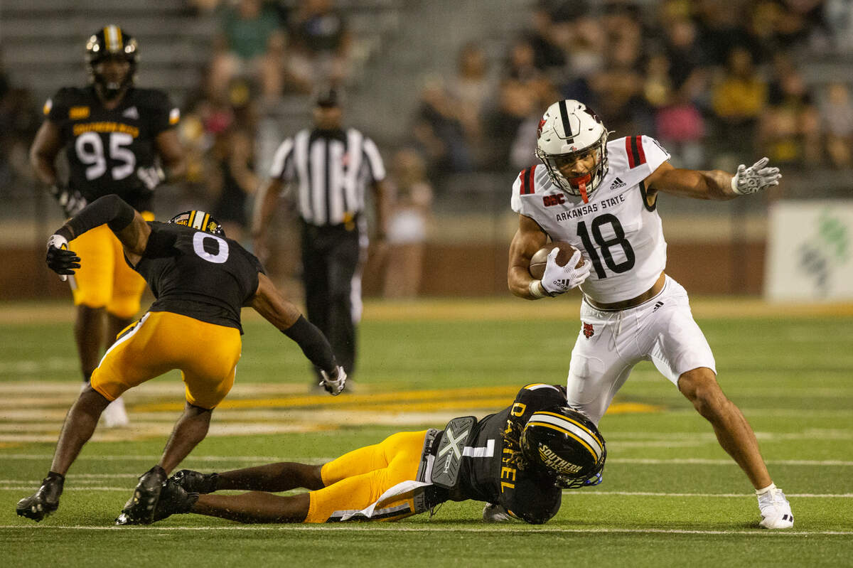 Southern Miss Golden Eagles safety Lakevias Daniel (1) tackles Arkansas State’s Seydou Traore during a game against Arkansas State at M.M. Roberts Stadium in Hattiesburg on Saturday, Oct. 15, 2022.