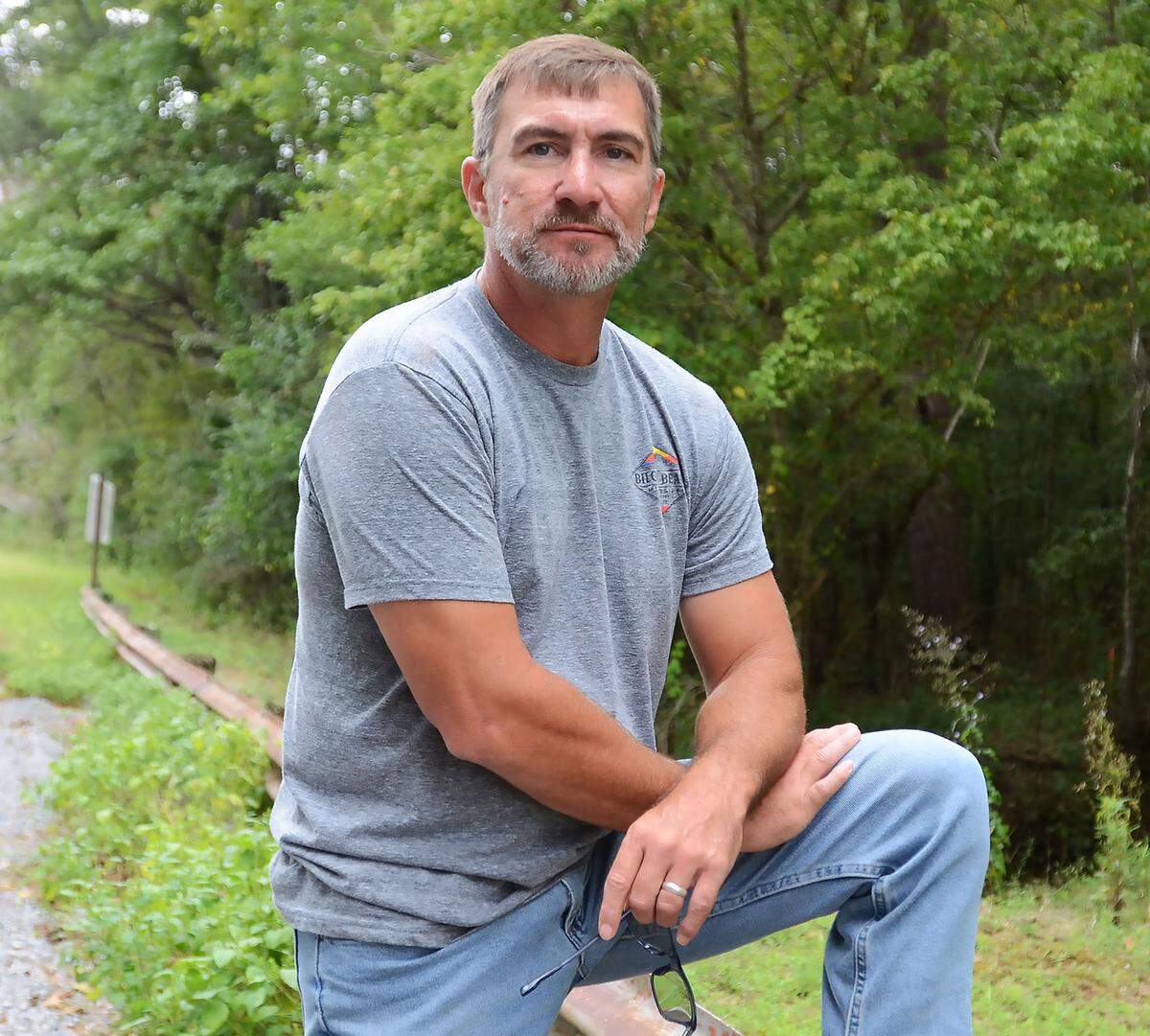 Lane Fikes of Carthage, alleged victim of Goon Squad members, near a property he owns in Leake County, Friday, Sept. 13, 2024.