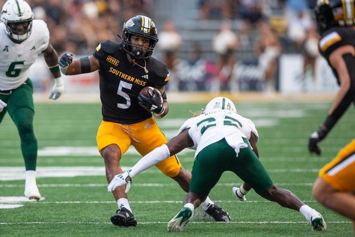 Southern Miss Golden Eagles running back Kenyon Clay (5) runs the ball during a game between Southern Miss and South Florida at M.M. Roberts Stadium in Hattiesburg on Saturday, Sept. 14, 2024.