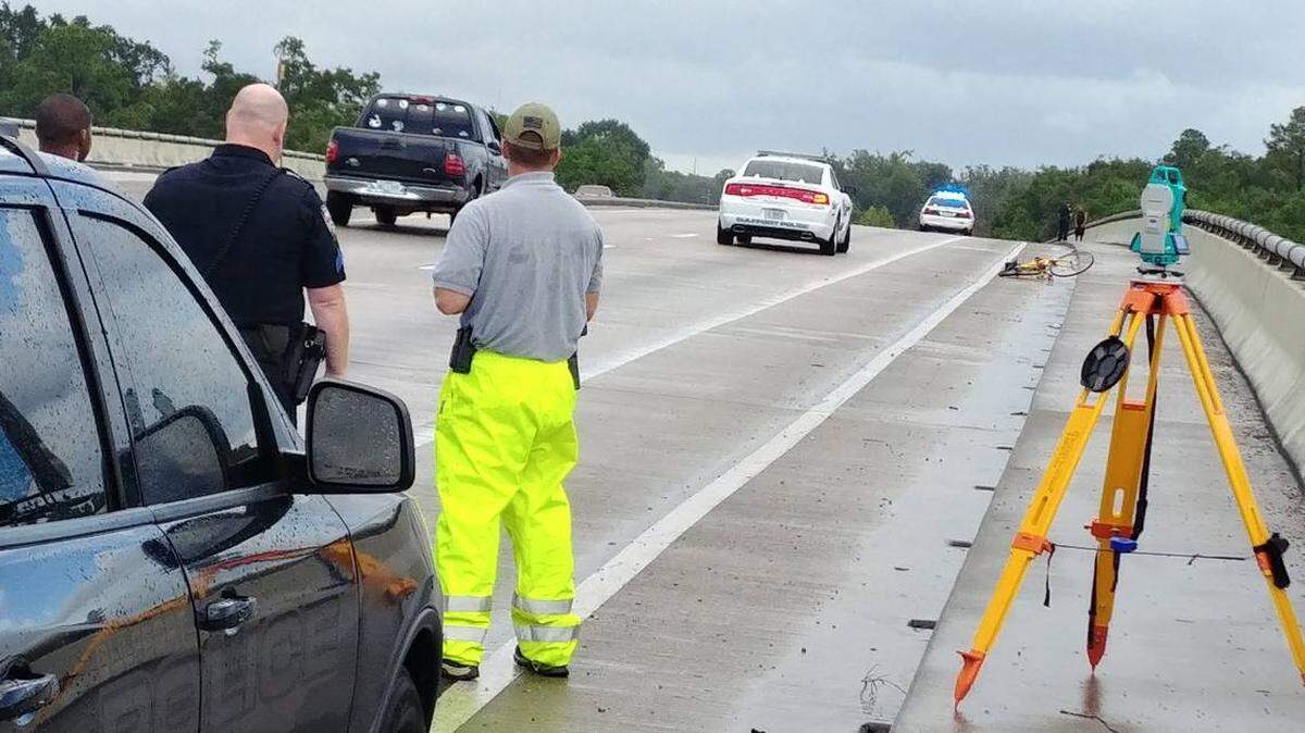 Police investigate a car-pedestrian crash that killed a Gulfport woman after she was struck from behind Sept. 2, 2018, on the Kremer Bridge in Gulfport.