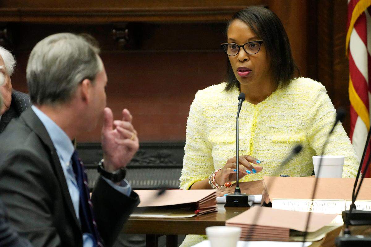 Mississippi House Appropriations A Committee Vice Chair Angela Cockerham, I-Magnolia, right, confers with State Rep. Sam Mims, R-McComb, on Project Atlas.