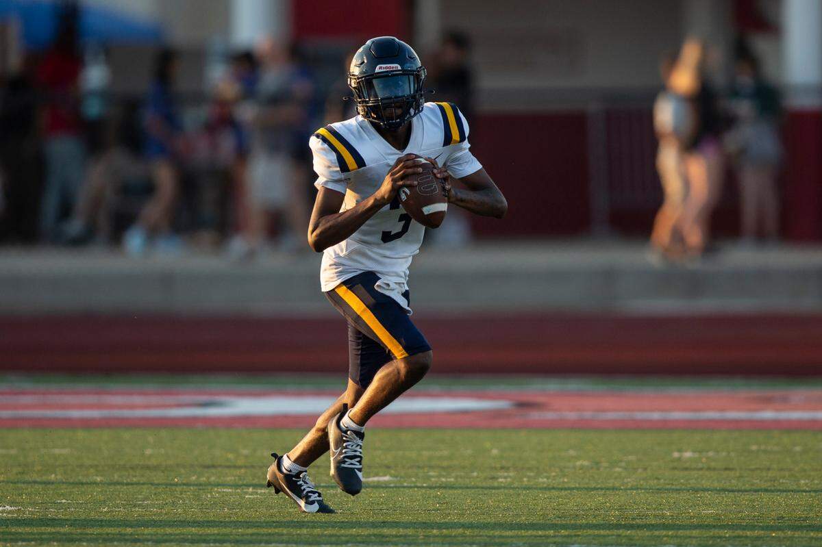 Gautier quarterback Trey Irving throws a pass during a Jamboree game at Biloxi High School on Friday, Aug. 18, 2023.