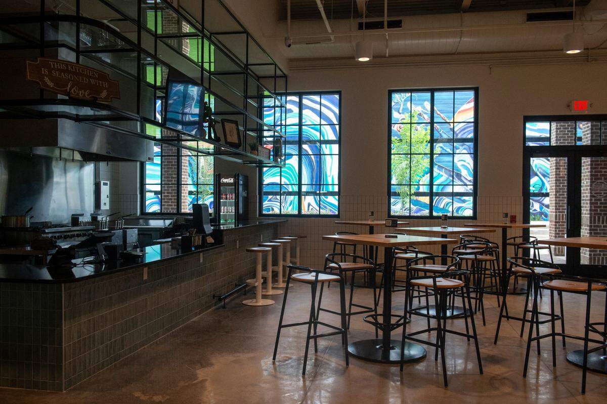 The dining area inside of Crave, the new food hall at OS1515 in Ocean Springs on Thursday, May 15, 2025.