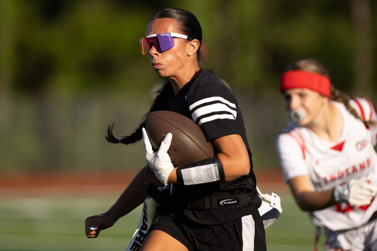 George County’s Lani McDoniel (7) runs the ball during a flag football playoff game at Biloxi High School on Monday, May 4, 2026.
