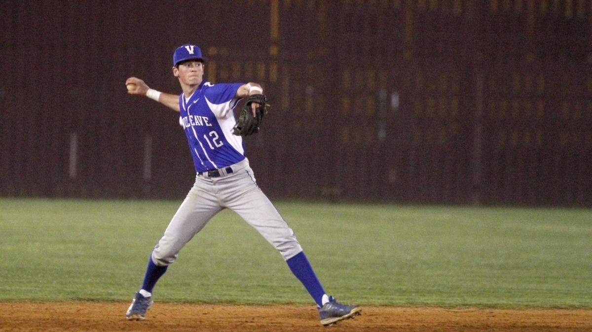 TIM ISBELL/SUN HERALD 
 Vancleave shortstop Colton Hipp throws to first after fielding a ground ball, Friday, Apr. 8, 2016.