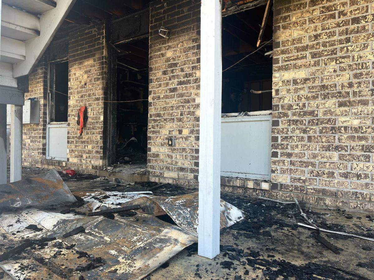 Damage is visible Tuesday after a fire at Sugar Mill Apartments in Gulfport.