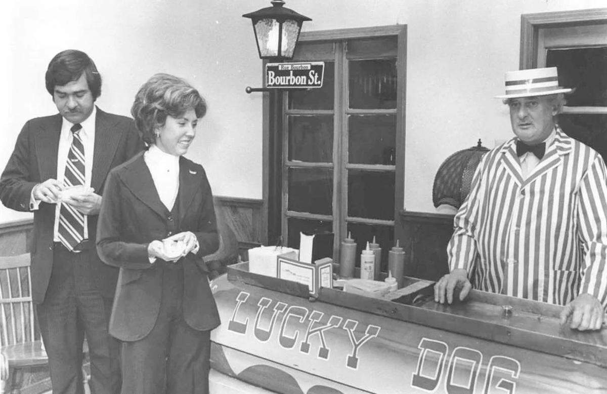 Jim and Patsy Bonner grab some Lucky Dogs in a 1977 photo. The Lucky Dog company revamped its iconic carts in 1984 ahead of the World’s Fair.