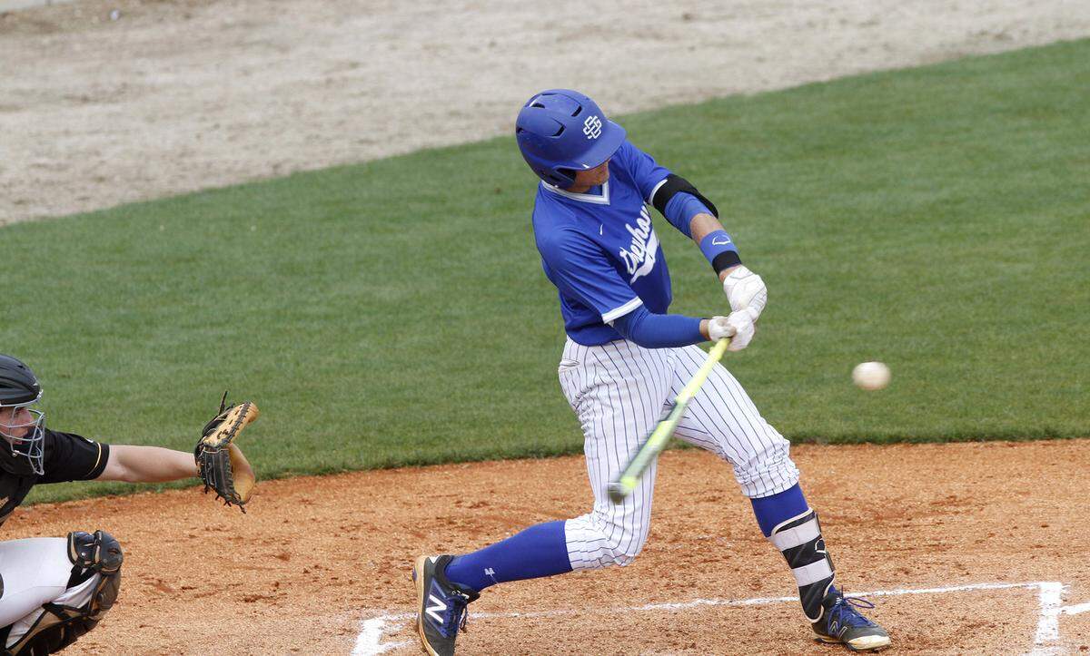 TIM ISBELL/SUN HERALDOcean Springs third baseman Drew Windham knocked in four runs to lead the Greyhounds to a victory over Oak Grove, Saturday, March 26, 2016. 