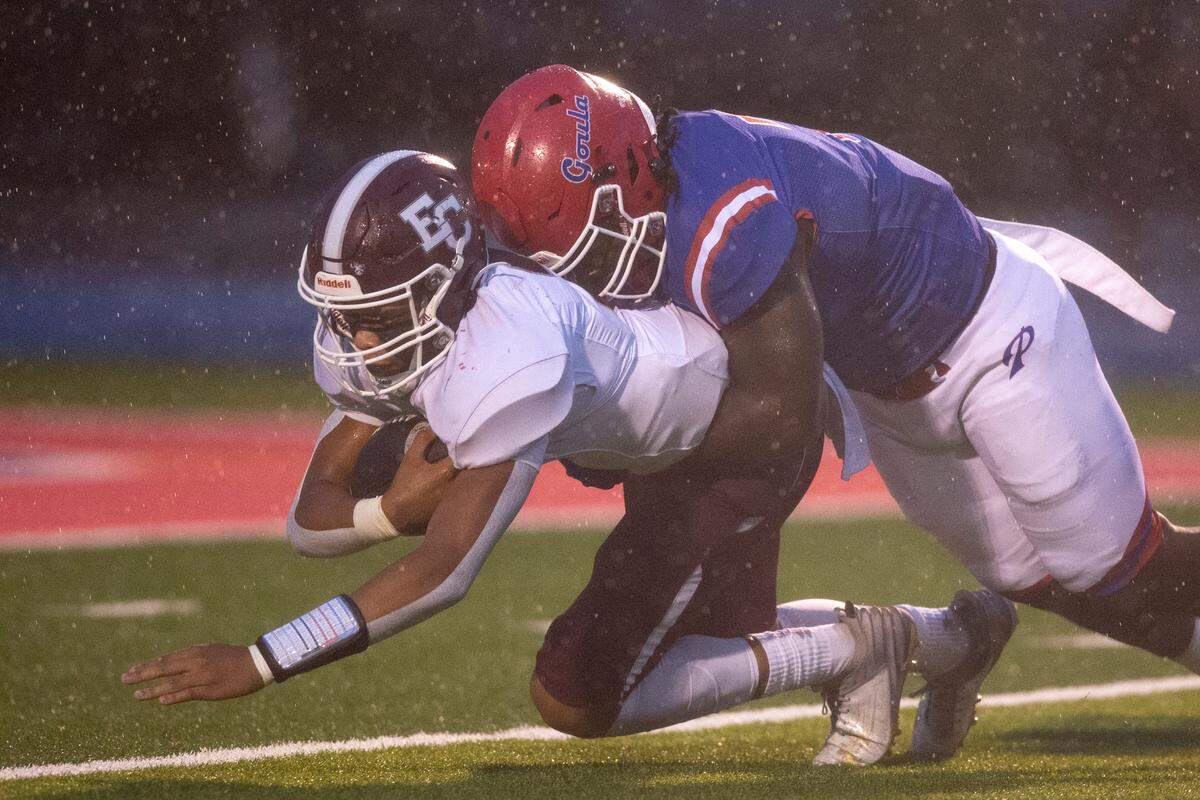 Pascagoula’s Jarrad Loper tackles East Central quarterback Taye Guyton during a game against East Central at Pascagoula High School in Pascagoula on Friday, Sept. 6, 2024.