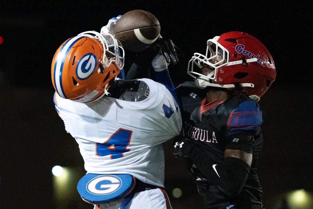 Pascagoula defensive back Kaiden Street (2) breaks up a pass to Gulfport wide receiver Javious Hales (4) during a football game at Pascagoula High School on Friday, Sept. 26, 2025.  Gulfport won the game 53-13.