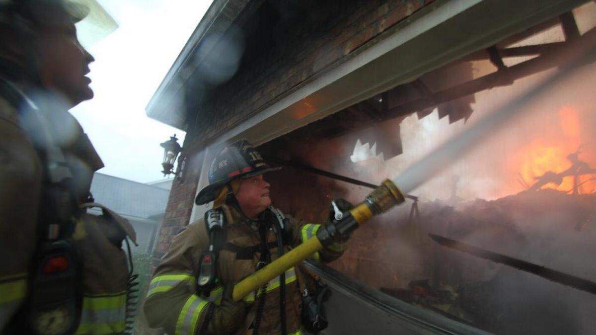 PAT SULLIVAN/HARRISON COUNTY FIRE SERVICE 
 A Harrison County home was destroyed in a fire Tuesday afternoon after it was struck by lightning. No one was injured.