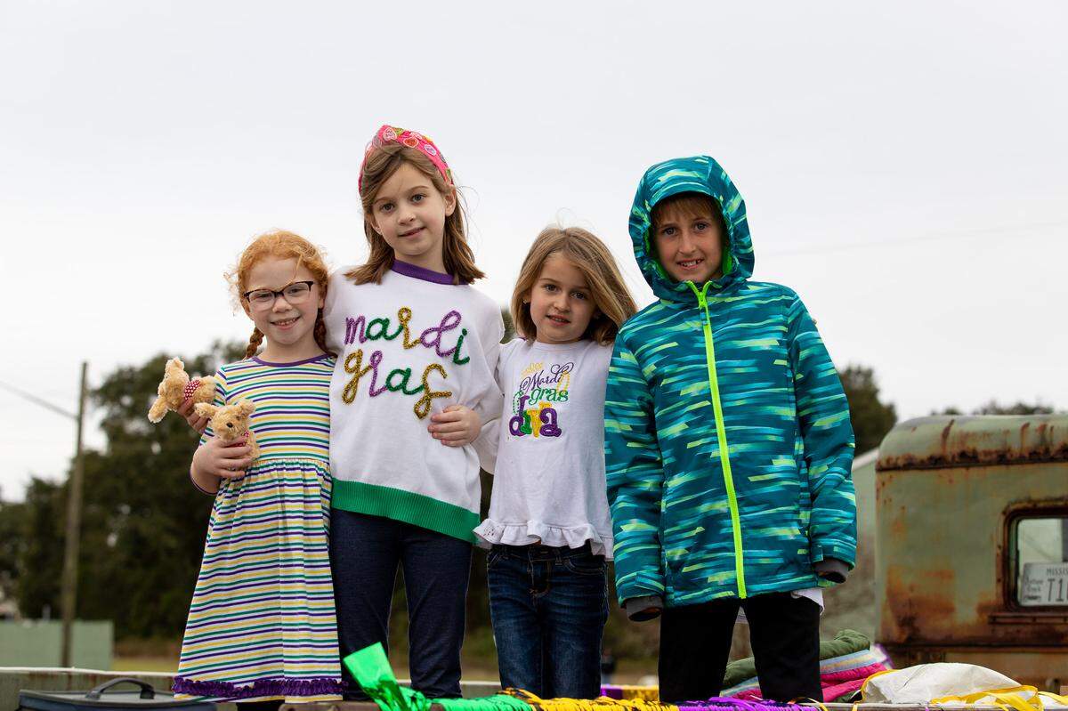 This year’s royal pages in Long Beach are, from left, Edith Williams, Anniston Brown, Ella Kate Levens and Reid Levens. They will join their families at the coronation ball Friday.