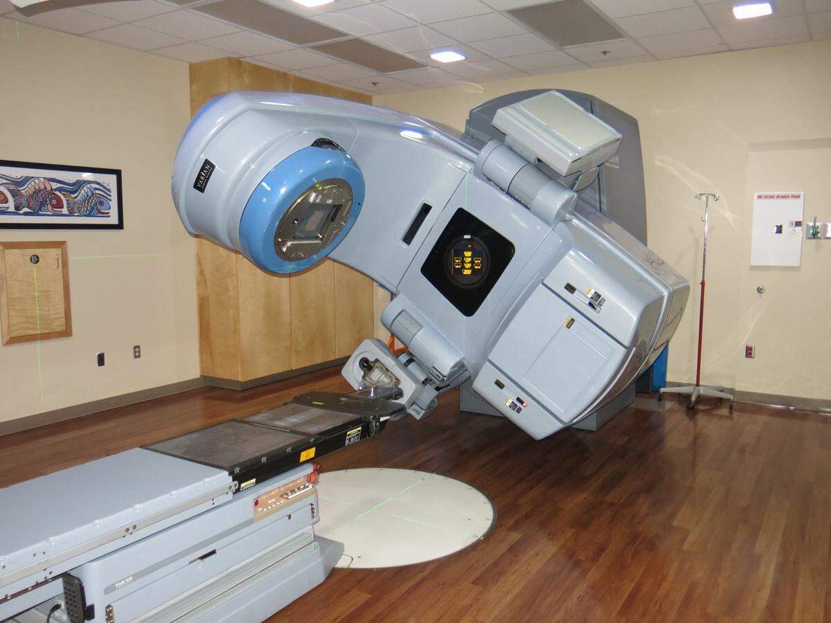 A medical linear accelerator used to treat cancer patients at Singing River Health System targets tumors while sparing surrounding tissue. State-directed funding that compensated for low Medicaid payments has helped the health system buy new equipment and machines, but funding cuts are slated.