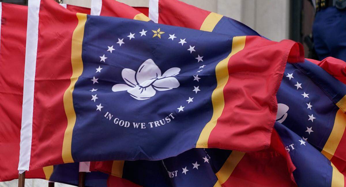 A bank of Mississippi State flags wave during the inauguration of Mississippi Republican Gov. Tate Reeves at the Mississippi State Capitol in Jackson earlier this month.