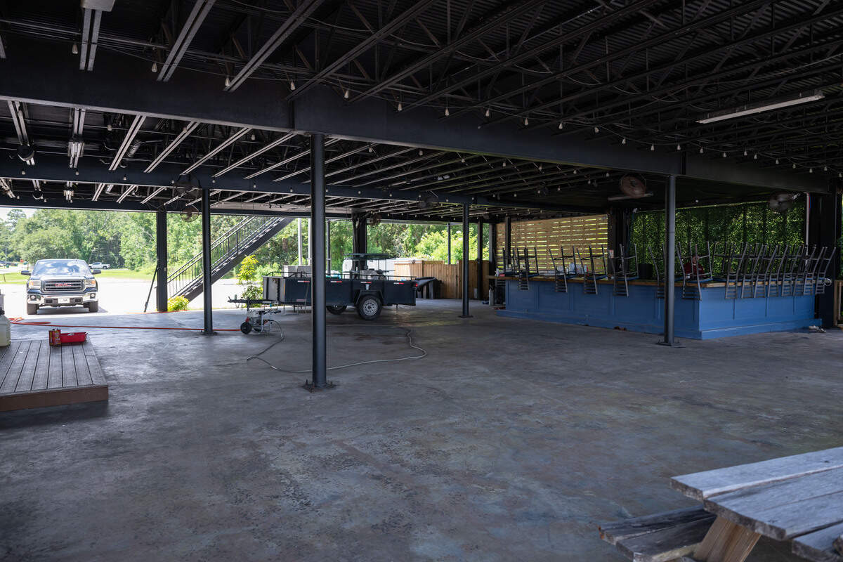 A ground floor space with a bar, area for dining and a stage for live music at Claw Daddy’s new location in Gulfport on Wednesday, July 8, 2026.