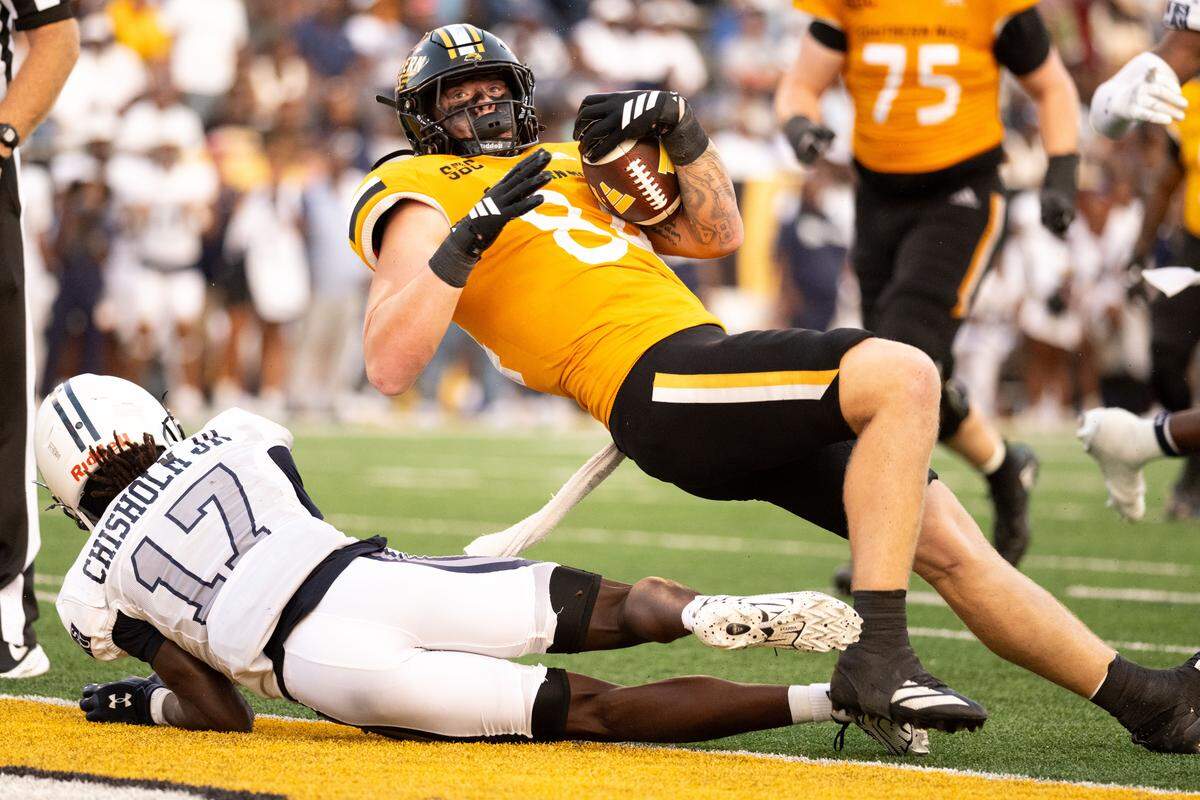 Southern Miss tight end Kadinn Morris (84) stumbles into the end zone for a touchdown Saturday in the Golden Eagles’ victory over Jackson State.