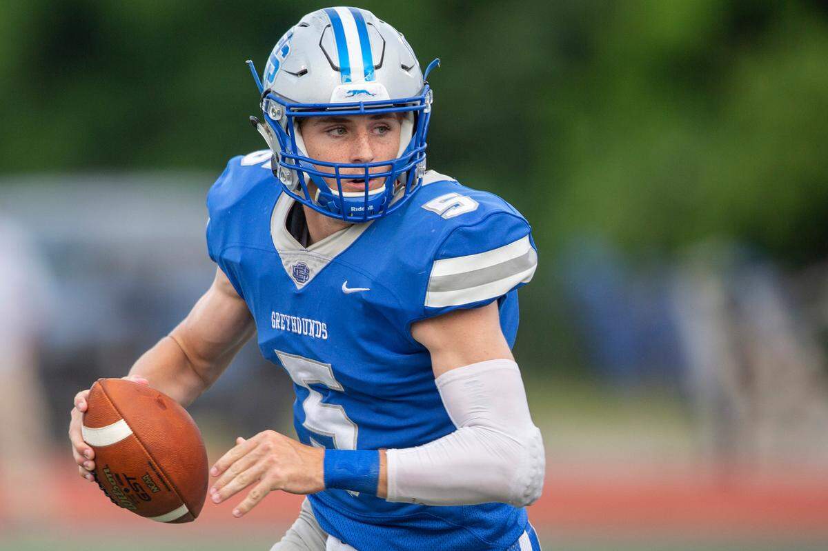 Ocean Springs quarterback Bray Hubbard prepares to throw a pass during a Spring Game against Picayune at Greyhound Stadium in Ocean Springs on Friday, May 13, 2022.