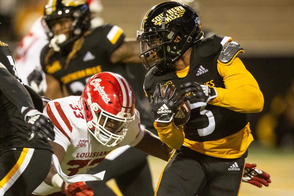 Southern Mississippi safety Tylan Knight (3) runs the ball during the second half of an NCAA college football game in Hattiesburg, Miss., Thursday, Oct. 27, 2022. (Hannah Ruhoff/The Sun Herald via AP)