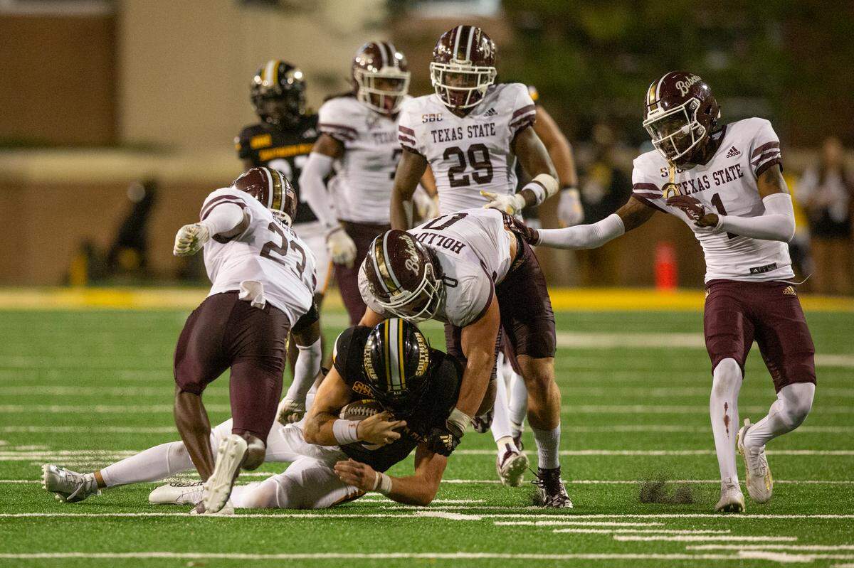 Texas State’s defense tackles during a game against Southern Miss at M.M. Roberts Stadium in Hattiesburg on Saturday, Sept. 30, 2023.