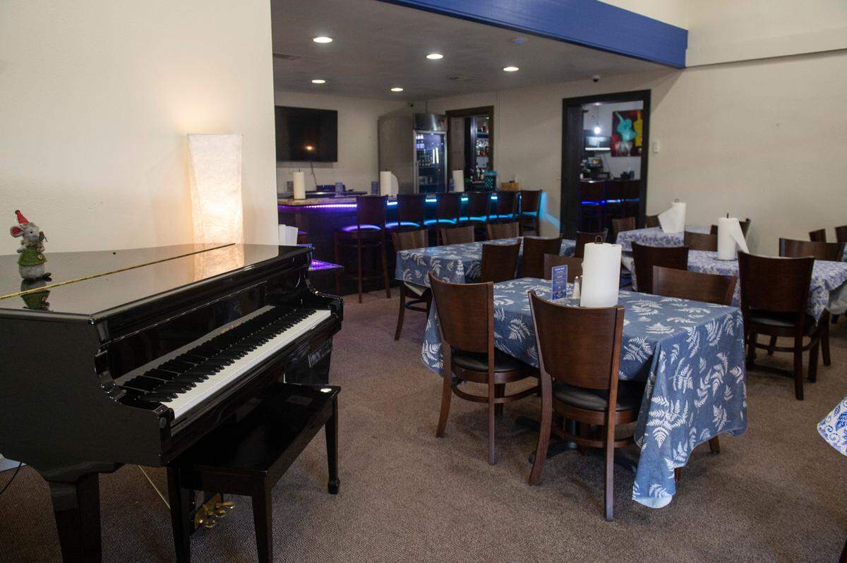 Dining areas at the new 38 Degrees Family Style Dining in Ocean Springs are decorated in blue and white.