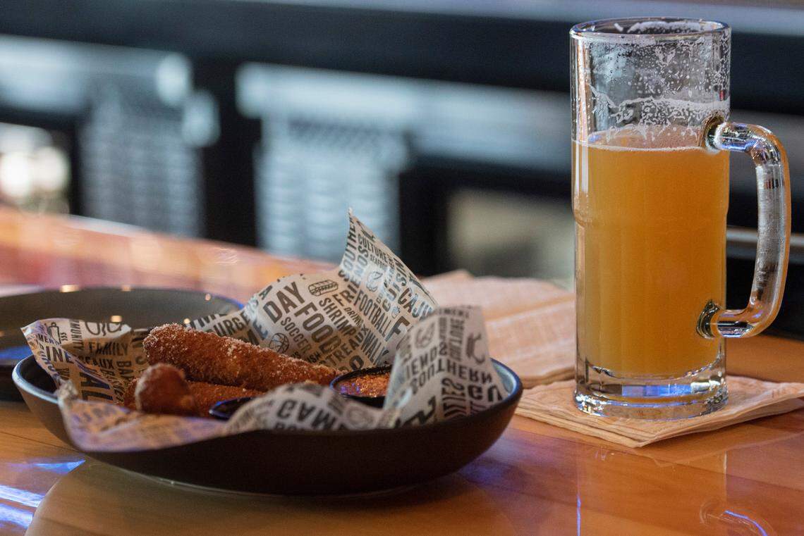 Mozzarella logs and beer are favorites on the menu at Walk-On’s Sports Bistreaux in D’Iberville, which opens Sept. 26.