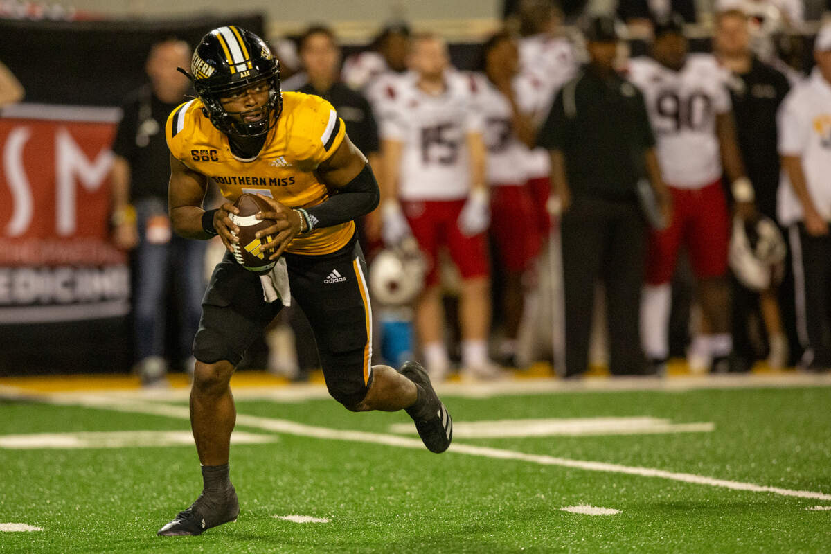 Southern Miss Golden Eagles quarterback Ethan Crawford (3) looks for a pass during a game between Southern Miss and Arkansas State at M.M. Roberts Stadium in Hattiesburg on Saturday, Oct. 19, 2024.