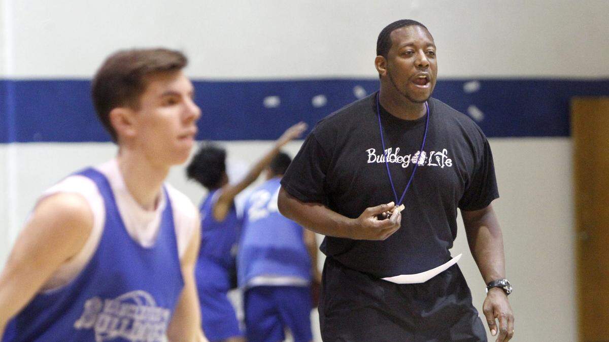 TIM ISBELL/SUN HERALD 
 Robert Johnson shouts instructions to his Vancleave players during practice, Wednesday, Jan. 13, 2016.