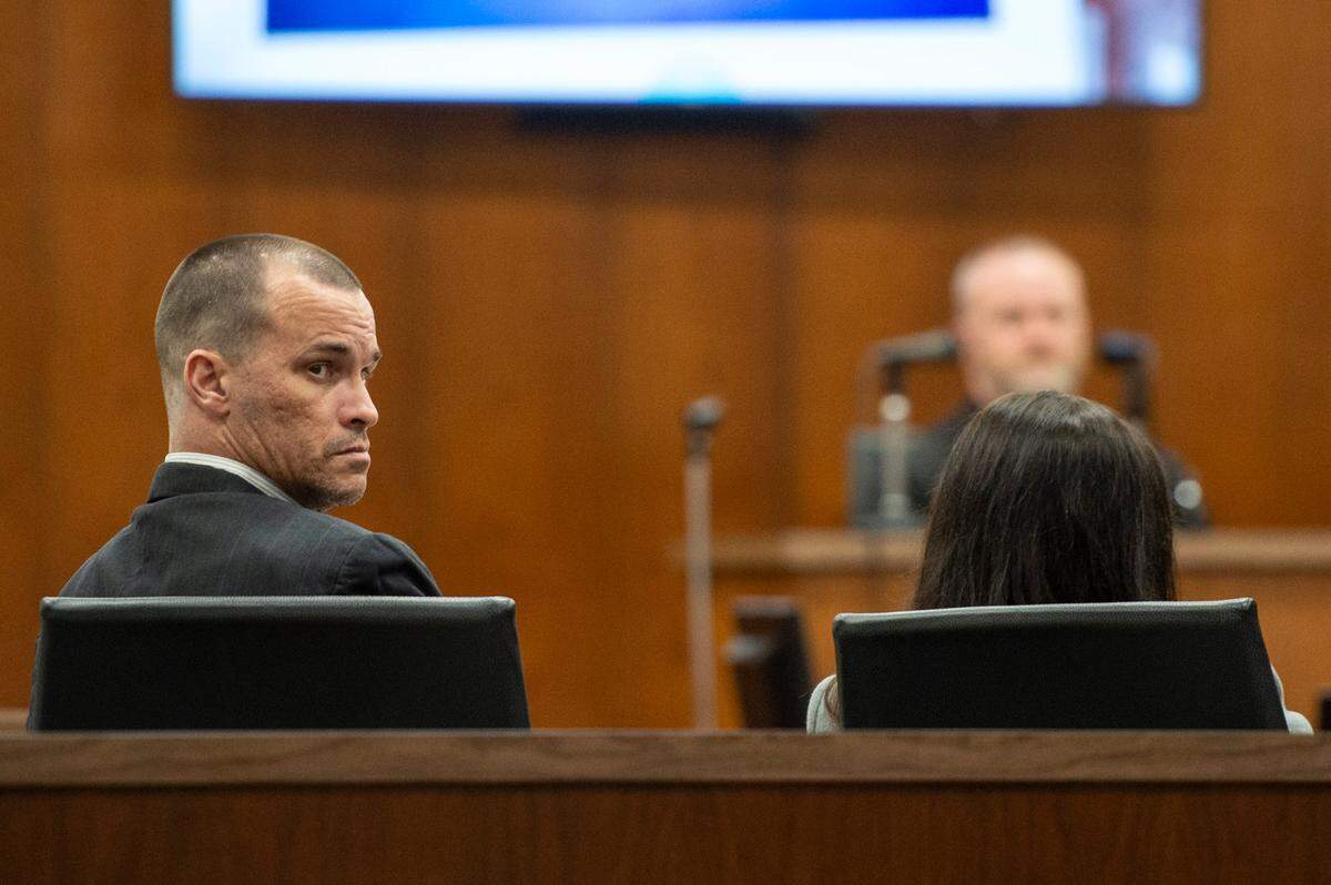 Gary Wayne Wallace looks back at those sitting in the audience during his murder trial at Harrison County Circuit Court in Biloxi on Tuesday, March 8, 2022.